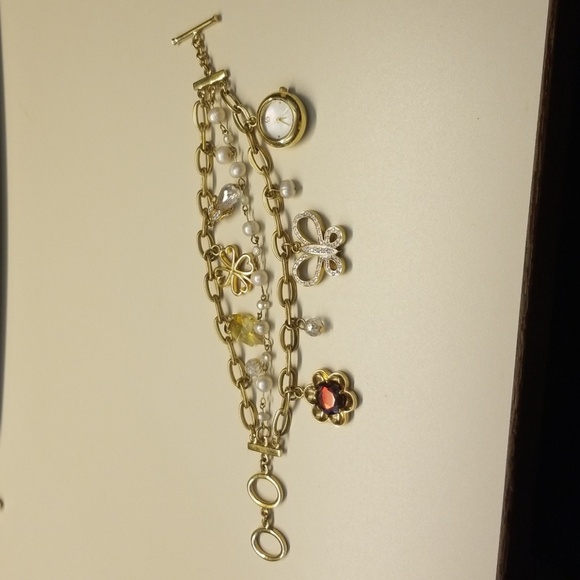 Gold charm bracelet with watch. - Picture 1 of 6